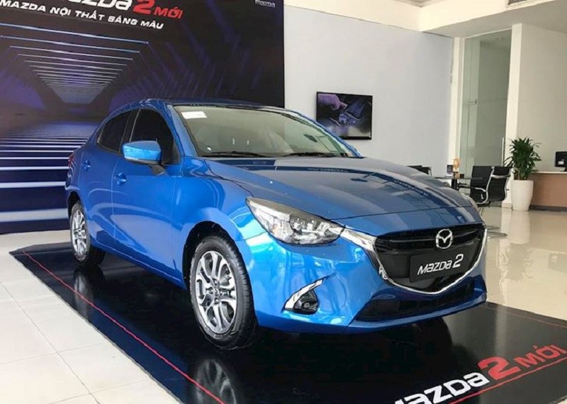 thay-kinh-chan-gio-xe-oto-mazda-2 Thay Kính Chắn Gió Xe Oto Mazda 2