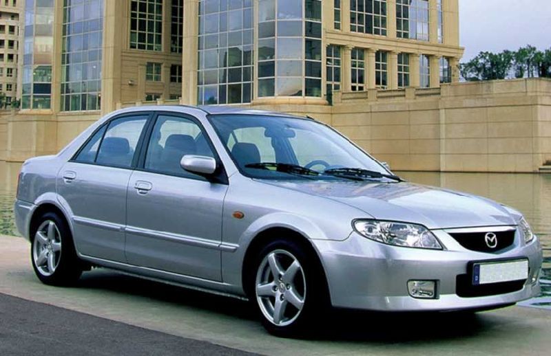 thay-kinh-chan-gio-xe-oto-mazda-323 Thay Kính Chắn Gió Xe Oto Mazda 323